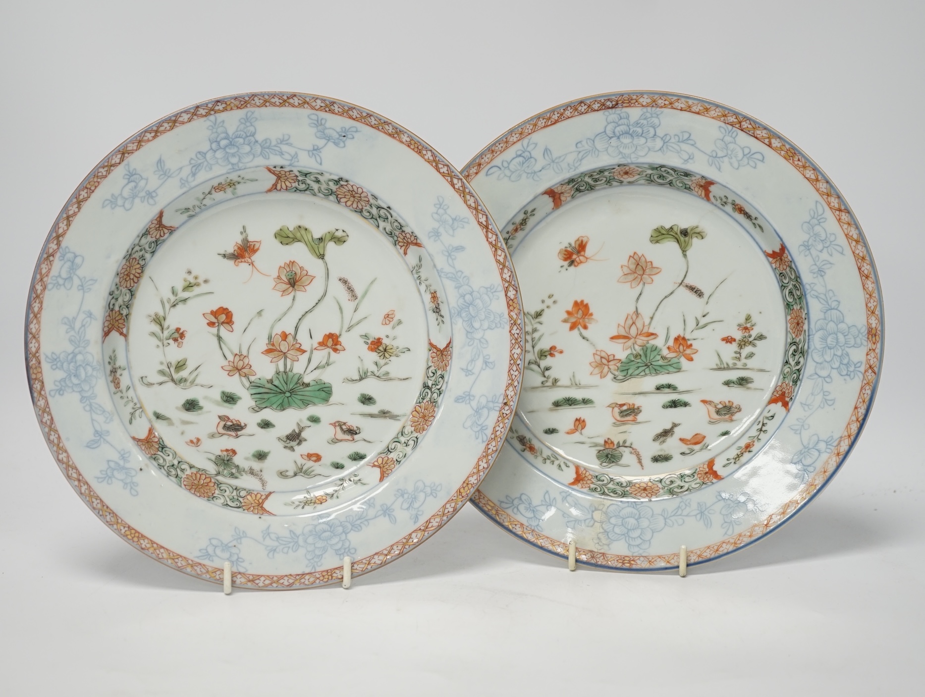 A pair of Chinese famille verte ‘lotus pond’ plates, Kangxi-Yongzheng period, 22.5cm